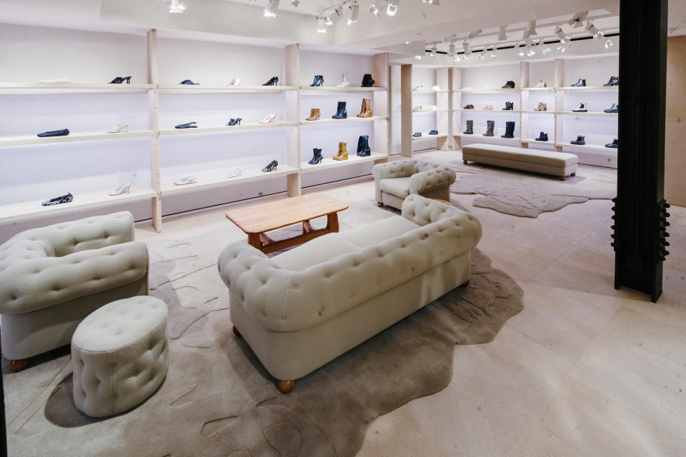 Footwear and the Chesterfield sofa at the renovated Burberry flagship.