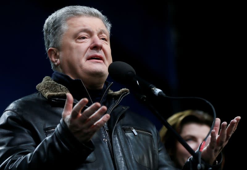 Ukraine's former President Petro Poroshenko takes part in a rally ahead of the so-called "Normandy" format summit, in Kiev