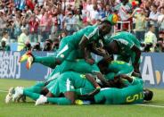 Soccer Football - World Cup - Group H - Poland vs Senegal - Spartak Stadium, Moscow, Russia - June 19, 2018 Senegal's M'Baye Niang celebrates scoring their second goal with team mates REUTERS/Grigory Dukor