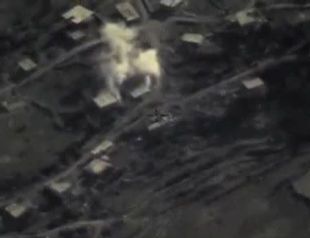 Still image taken from aerial footage released by Russia's Defence Ministry on February 11, 2016, shows airstrikes, carried out by the country's air force and hitting what the Defence Ministry says was Islamic State militants' stronghold, in Latakia, Syria. REUTERS/Ministry of Defence of the Russian Federation/Handout via Reuters