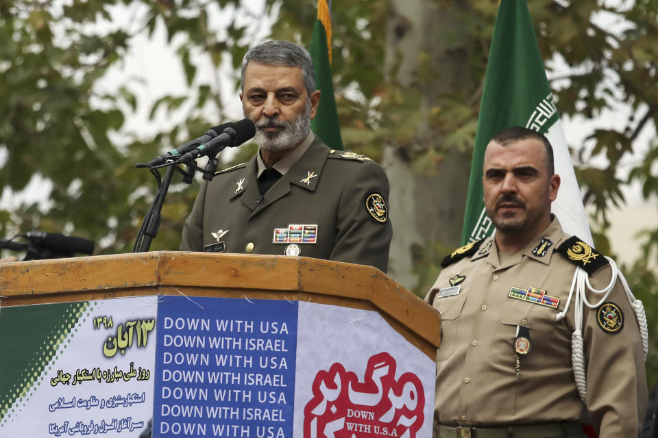 Commander of the Iranian army Gen. Abdolrahim Mousavi speaks an anti-U.S. annual rally in front of the former U.S. Embassy in Tehran, Iran, Monday, Nov. 4, 2019. The rally revived decades-old cries of "Death to America," in Iran on Monday marked the 40th anniversary of the 1979 student takeover of the U.S. Embassy in Tehran. (AP Photo/Vahid Salemi)