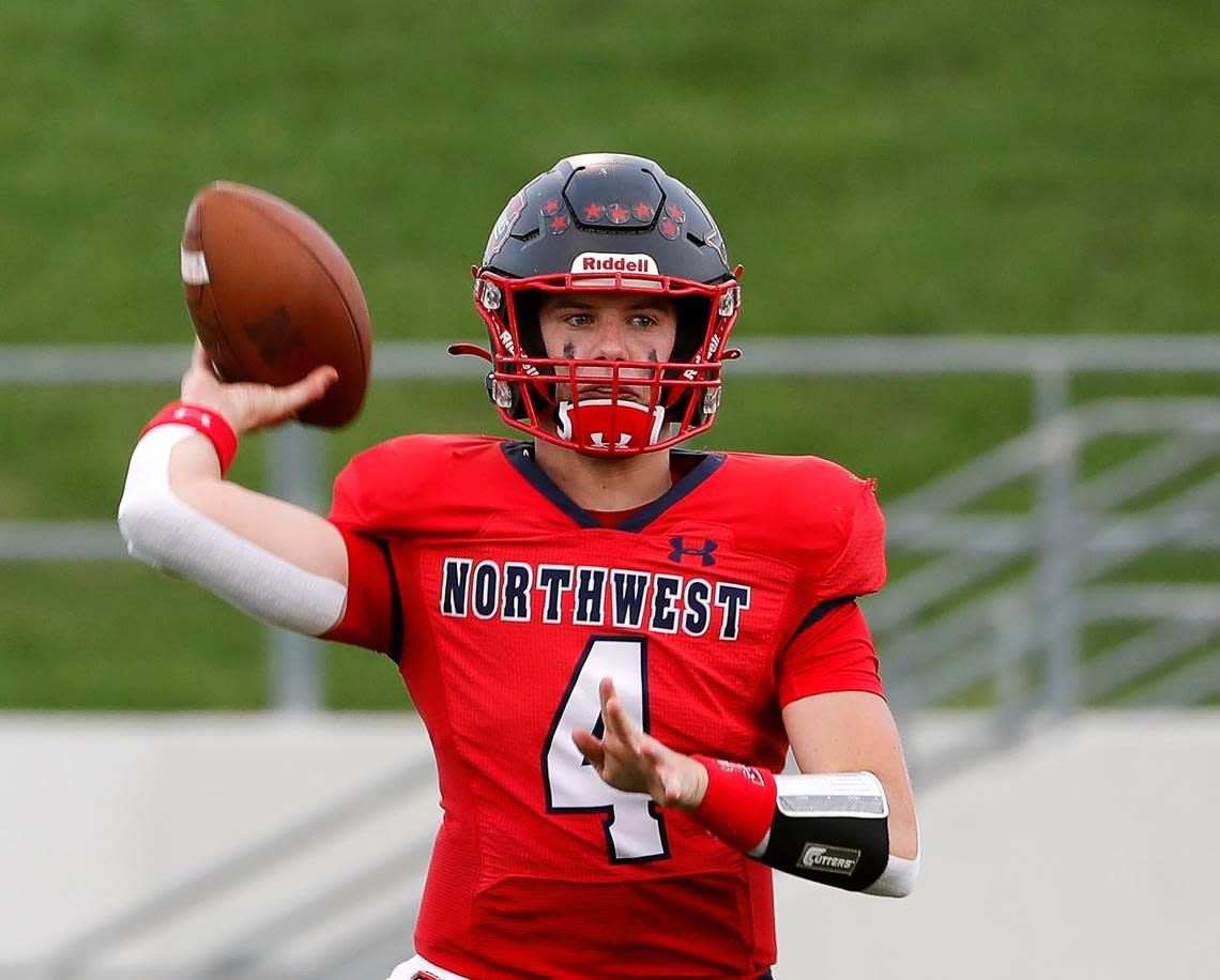 Northwest quarterback Jake Strong (4) threw for five touchdowns in a 65-0 win over South Hills.