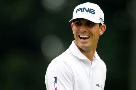 Sep 14, 2014; Atlanta, GA, USA; Billy Horschel smiles while walking to the first green during the final round of the Tour Championship at East Lake Golf Club. Mandatory Credit: Brett Davis-USA TODAY Sports