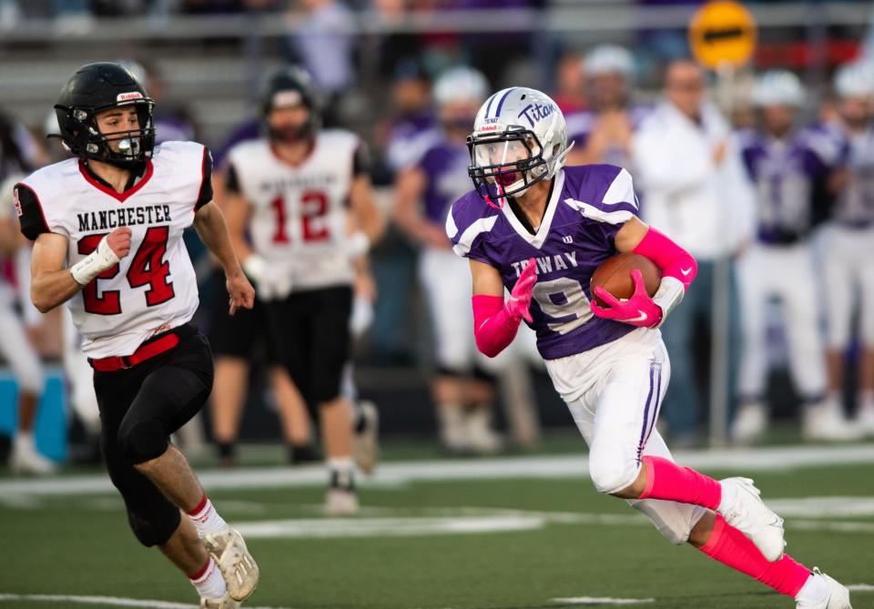 Triway's Cale Drown (left) breaks into open field with a reception in the first quarter.