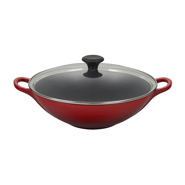 <p><strong>Le Creuset</strong></p><p>lecreuset.com</p><p><a href="https://go.redirectingat.com?id=74968X1596630&url=https%3A%2F%2Fwww.lecreuset.com%2Fwok-factory-to-table-sale-cerise%2FL2508-3267.html&sref=https%3A%2F%2Fwww.countryliving.com%2Fshopping%2Fg33573753%2Fle-creuset-factory-sale-august-2020%2F" rel="nofollow noopener" target="_blank" data-ylk="slk:Shop Now;elm:context_link;itc:0;sec:content-canvas" class="link ">Shop Now</a></p><p><strong><del>$275</del></strong> <strong>$165 (40% off)</strong></p><p>Anyone who wants to add a new recipe to their repertoire will find a lot to love about Le Creuset's Wok. Thanks to its cast-iron interior, whipping up some stir-fry has never been so easy or delicious. </p>
