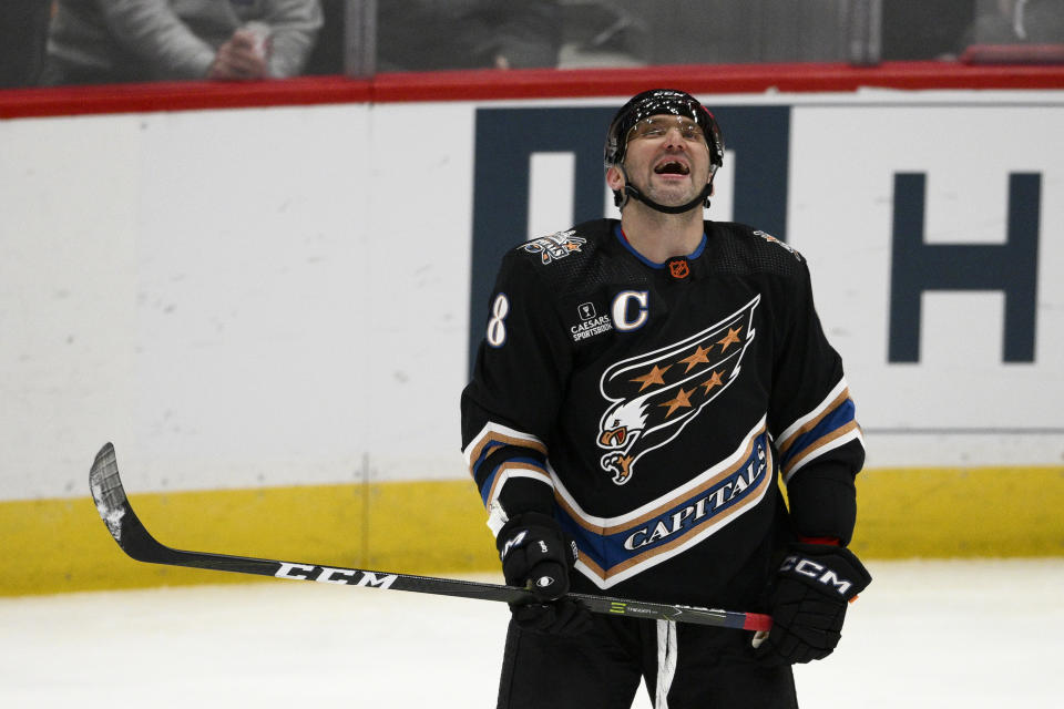 Washington Capitals left wing Alex Ovechkin (8) reacts after he missed a shot during the second period of an NHL hockey game against the Winnipeg Jets, Friday, Dec. 23, 2022, in Washington. (AP Photo/Nick Wass)