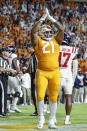 Tennessee defensive lineman Omari Thomas (21) signals a safety during the first half of the team's NCAA college football game against Mississippi on Saturday, Oct. 16, 2021, in Knoxville, Tenn. (AP Photo/Wade Payne)