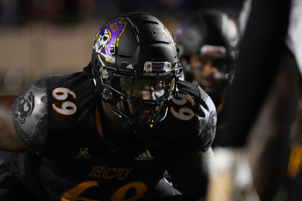 Oct 22, 2022; Greenville, North Carolina, USA;  East Carolina Pirates offensive lineman Noah Henderson (69) against the UCF Knights during the second half at Dowdy-Ficklen Stadium. Mandatory Credit: James Guillory-USA TODAY Sports