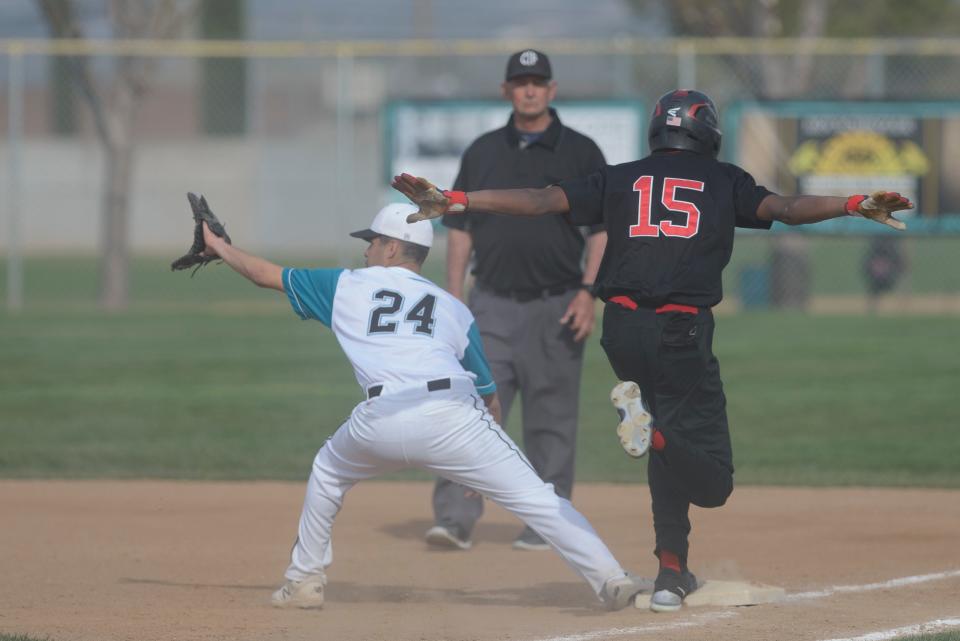 Oak Hills' Jacob Webster makes it safely to first base during the fifth inning against Sultana on Tuesday, April 11, 2023. Sultana defeated Oak Hills 7-5.