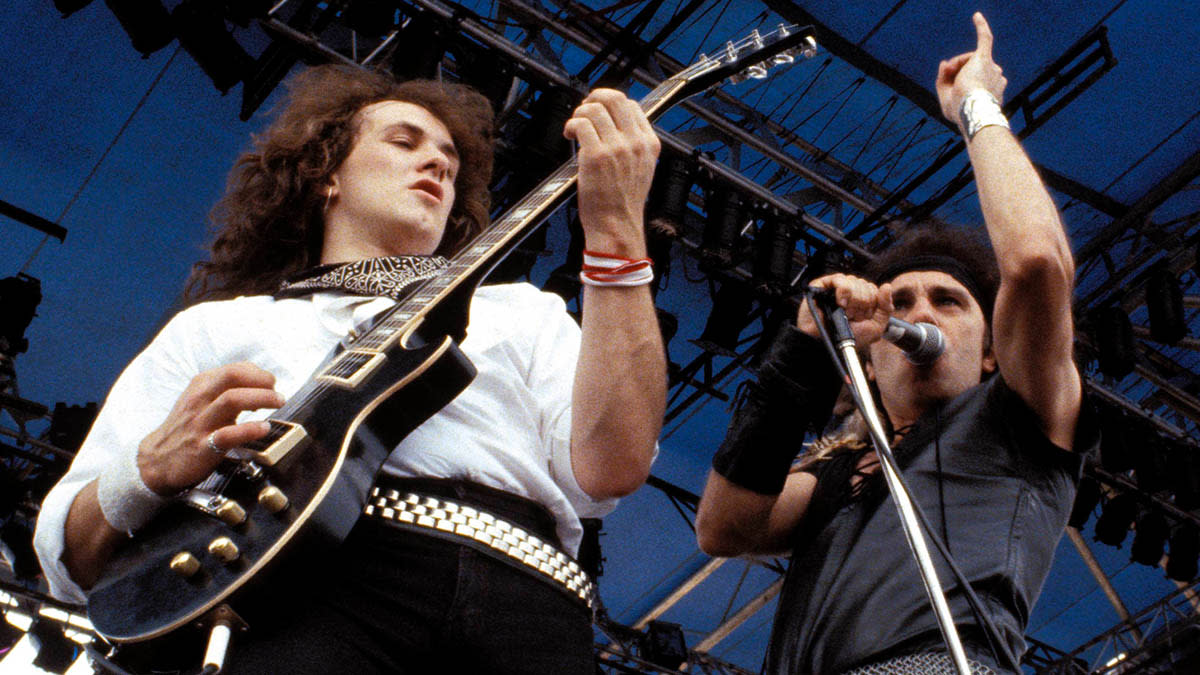  Vivian Campbell and Ronnie James Dio onstage with Dio in 1983. 