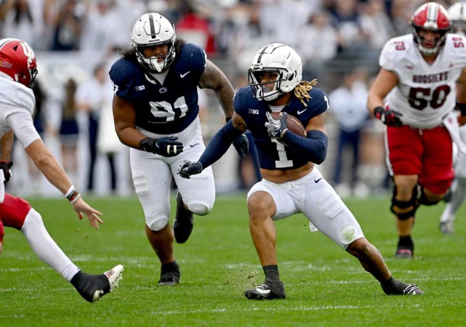 Penn State safety Jaylen Reed cuts down the field with the ball after making an interception during the game against Indiana on Saturday, Oct. 28, 2023.
