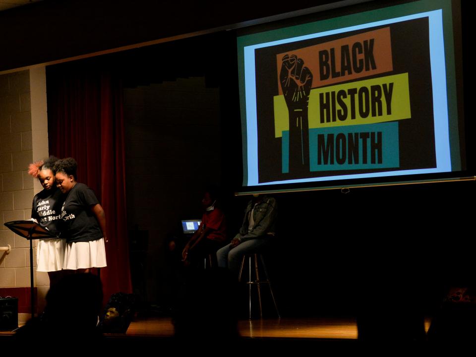 John Early Museum Magnet Middle School students, Tylisa Asked, 11, left, and Za-Cari Phillips, 12, read poetry during a Black History Month celebration at the school on Wednesday, Feb. 23, 2022, in Nashville, Tenn. 