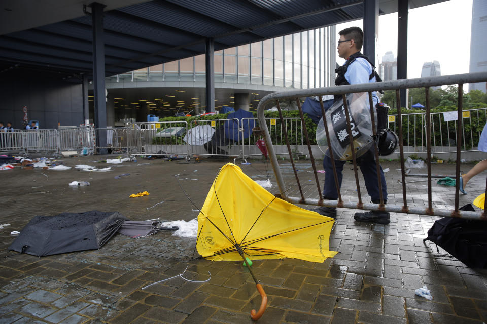 A riot police patrols outside the Legislative Council in Hong Kong, Thursday, June 13, 2019. Traffic has been restored in the heart of Hong Kong a day after clashes between police and protesters who oppose legislation that would allow criminal suspects to be sent to mainland China for trial. (AP Photo/Kin Cheung)