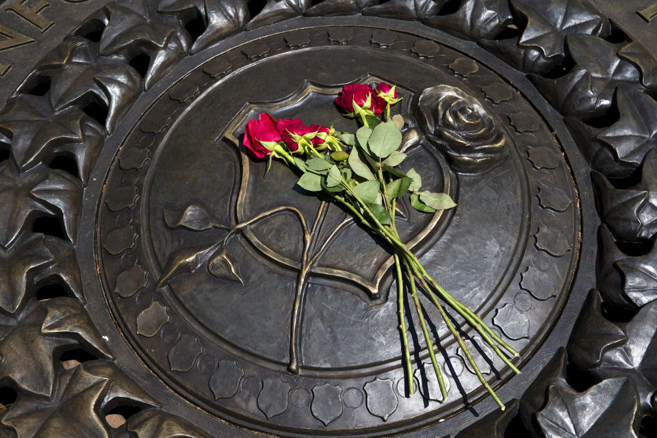 Roses laid at Memorial