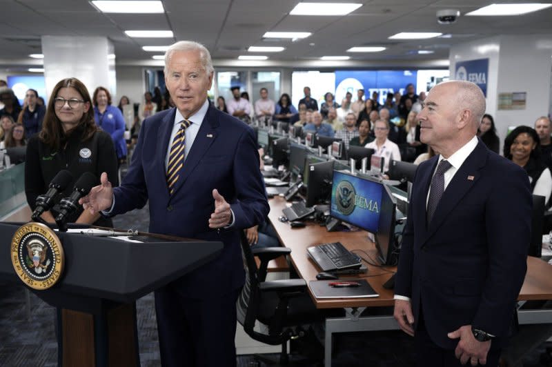 U.S. President Joe Biden, with Department of Homeland Security Secretary Alejandro Mayorkas (R), delivers remarks as he visits FEMA headquarters in Washington, D.C., on Thursday. Photo by Yuri Gripas/UPI