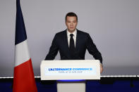 Far-right National Rally party president Jordan Bardella delivers his speech after the first round vote of the legislative election, Sunday, June 30, 2024 in Paris. France's high-stakes legislative elections propelled the far-right National Rally to a strong but not decisive lead in the first-round vote Sunday, polling agencies' projected, dealing another slap to centrist President Emmanuel Macron after his risky decision to call voters back to the polls for the second time in three weeks. (AP Photo/Aurelien Morissard)