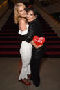 <p>The longtime pals hug as they celebrate mutual friend Rachel Zoe’s new fall 2018 fashion line in Hollywood on Monday. The <a rel="nofollow" href="https://www.yahoo.com/entertainment/yas-paris-hilton-engaged-chris-zylka-164405921.html" data-ylk="slk:newly engaged Hilton;elm:context_link;itc:0;sec:content-canvas;outcm:mb_qualified_link;_E:mb_qualified_link;ct:story;" class="link  yahoo-link">newly engaged Hilton</a> made sure to declare herself “taken.” (Photo: Michael Kovac/Getty Images for Belvedere Vodka) </p>