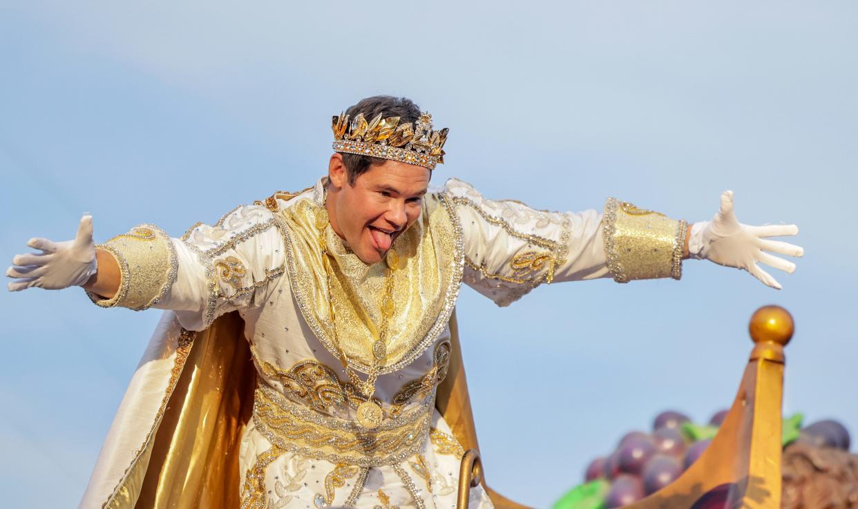 Comedian and actor Adam Devine reigns as Bacchus LIV as the Krewe of Bacchus rolls on the Uptown route on Sunday, Feb. 19, 2023, in New Orleans. (Brett Duke/The Times-Picayune/The New Orleans Advocate via AP) ORG XMIT: LAORS702