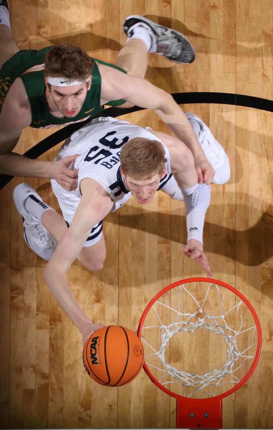 Connor Vanover #35 of the Oral Roberts Golden Eagles waits to rebound the ball in game against the North Dakota State Bison at the 2023 Summit League Basketball Championship at the Denny Sanford Premier Center in Sioux Falls, South Dakota.