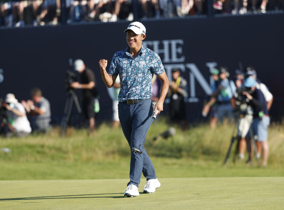 United States' Collin Morikawa celebrates on the 18th green after winning the British Open Golf Championship at Royal St George's golf course Sandwich, England, Sunday, July 18, 2021. (AP Photo/Peter Morrison)