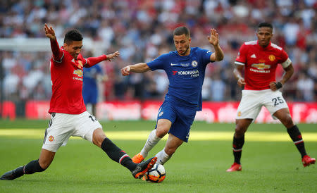 Soccer Football - FA Cup Final - Chelsea vs Manchester United - Wembley Stadium, London, Britain - May 19, 2018 Chelsea's Eden Hazard in action with Manchester United's Chris Smalling REUTERS/David Klein