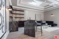 <p>This bar and lounge area is perfect for entertaining and maybe listening to Peters test out his stand up routine. <br> (Realtor.com) </p>