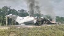 Video grab of a plane suspected of carrying drugs that was reportedly set alight after allegedly being intercepted by soldiers on Federal Highway 184 in Quintana Roo state, Mexico