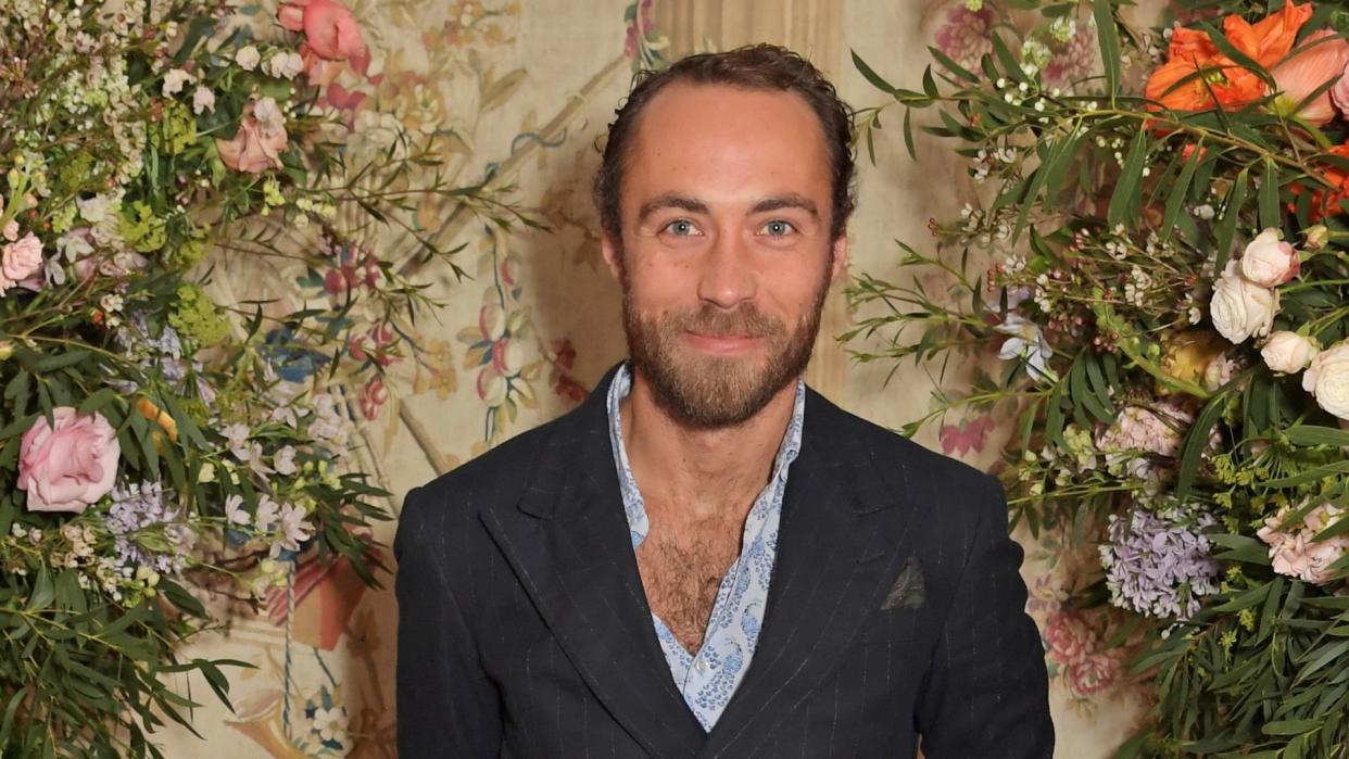 James Middleton smiling in a close up photo