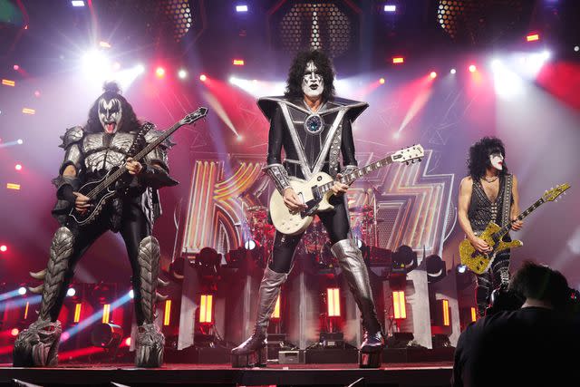 <p>Kevin Mazur/Getty</p> Gene Simmons, Eric Singer, Paul Stanley and Tommy Thayer of KISS perform during KISS: End of the Road World Tour at Madison Square Garden on December 1, 2023