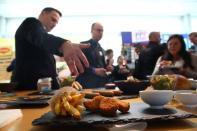 Palzer Chief Technology Officer gestures in front of plant based vegetarian dishes during a media presentation at Nestle in Vevey