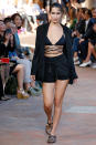 <p>Bella's strappy bikini top showed off her toned abs on the Alberta Ferretti runway.</p>