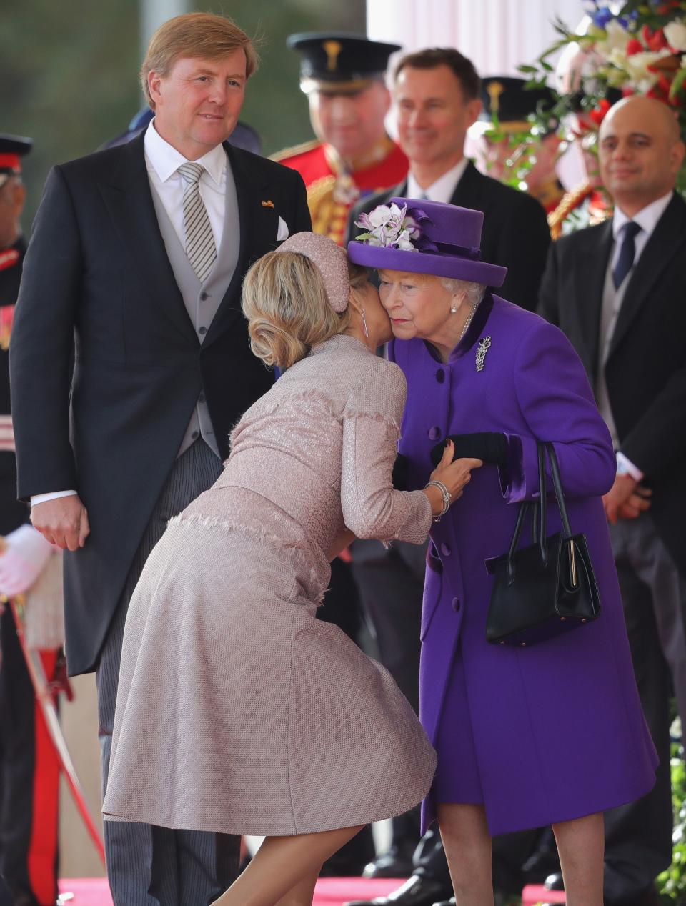 Queen Máxima of the Netherlands kissed Her Majesty on a state visit to the United Kingdom on Tuesday. Source: Getty