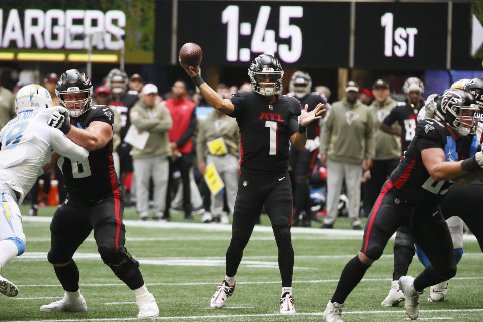 CORRECTS DATE TO SUNDAY, NOV. 6 INSTEAD OF TUESDAY, DEC. 6 - Atlanta Falcons quarterback Marcus Mariota (1) throws a pass during the first half of an NFL football game against the Los Angeles Chargers, Sunday, Nov. 6, 2022, in Atlanta. (AP Photo/Butch Dill)