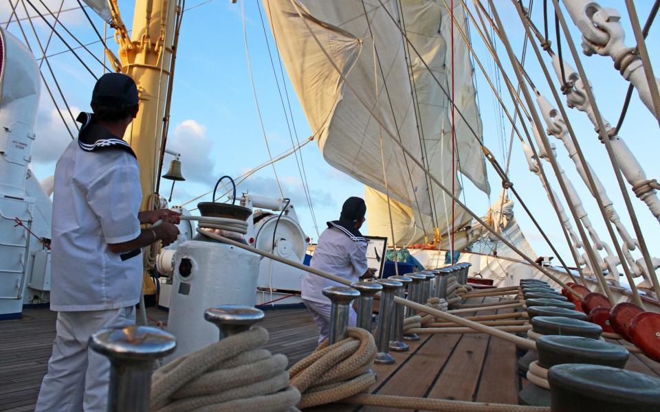 The crew hoisting some of the Royal Clipper's 42 sails