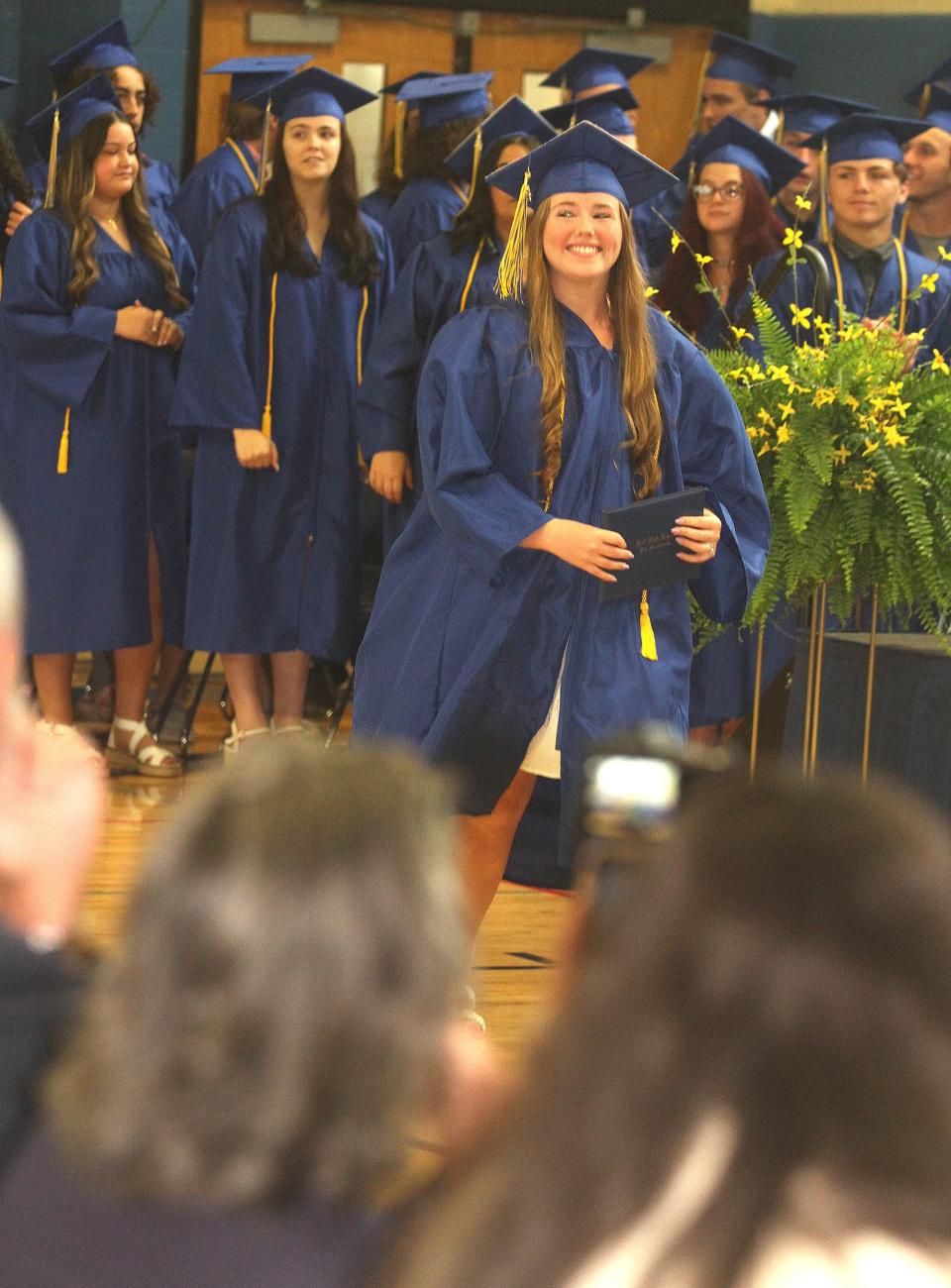 Juliet Adams smiles after getting her diploma during Hull High School's graduation on Saturday, June 3, 2023.