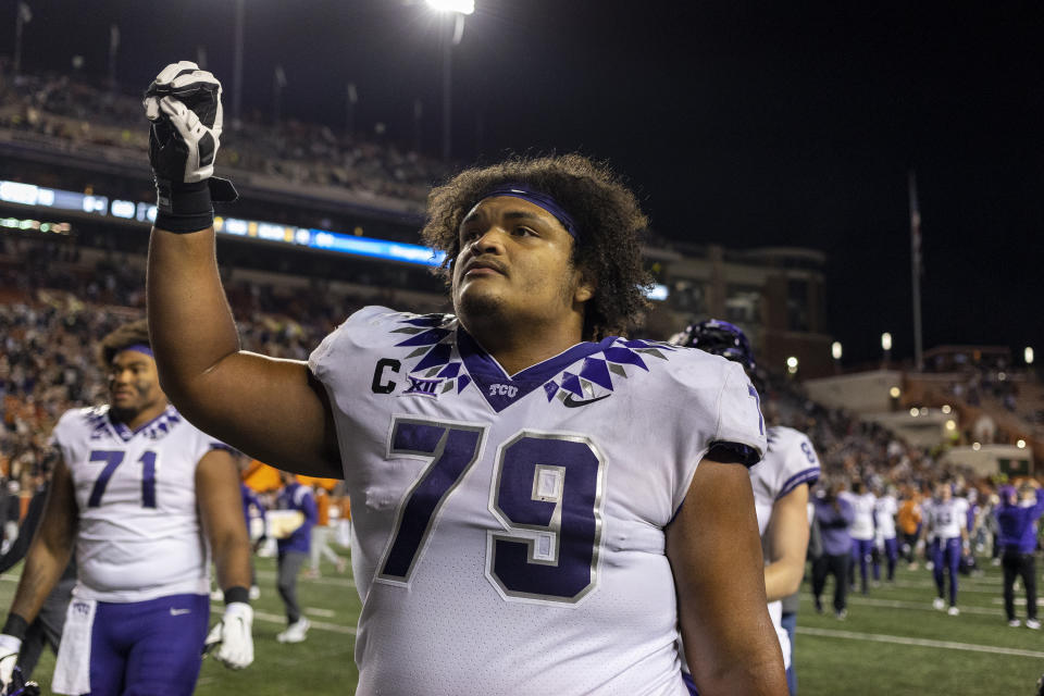 TCU center Steve Avila (79) celebrates the team's win over Texas in an NCAA college football game Saturday, Nov. 12, 2022, in Austin, Texas. (AP Photo/Stephen Spillman)