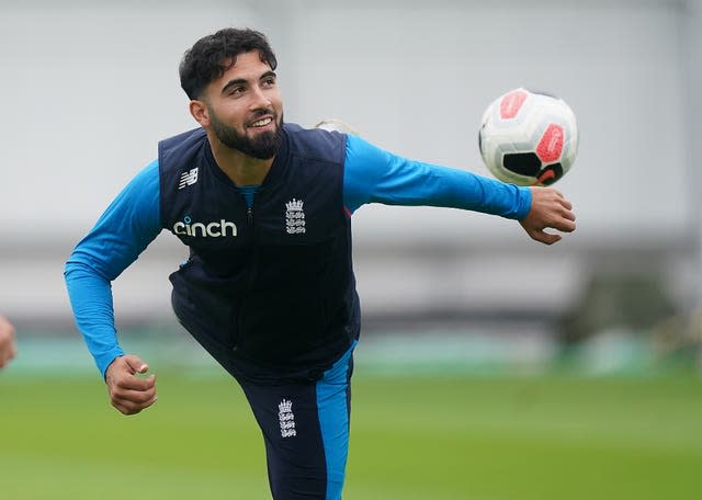 Saqib Mahmood, pictured, plays with James Anderson for club and country