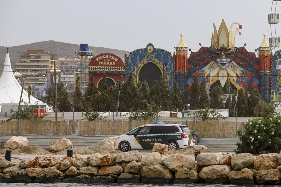 Mandatory Credit: Photo by Natxo Frances/EPA-EFE/Shutterstock (13089693c) A Civil Guard vehicle is parked outside the venue of the Medusa Music Festival after a stage partially collapsed in the early morning hours due to strong winds, in the coastal city of Cullera, Valencia, Spain, 13 August 2022. At least one person died and 17 others were injured when part of the main stage collapsed shortly after 04 a.m. local time, the regional emergency services said. At least one dead as music festival stage collapses amid strong winds in Spain, Cullera - 13 Aug 2022