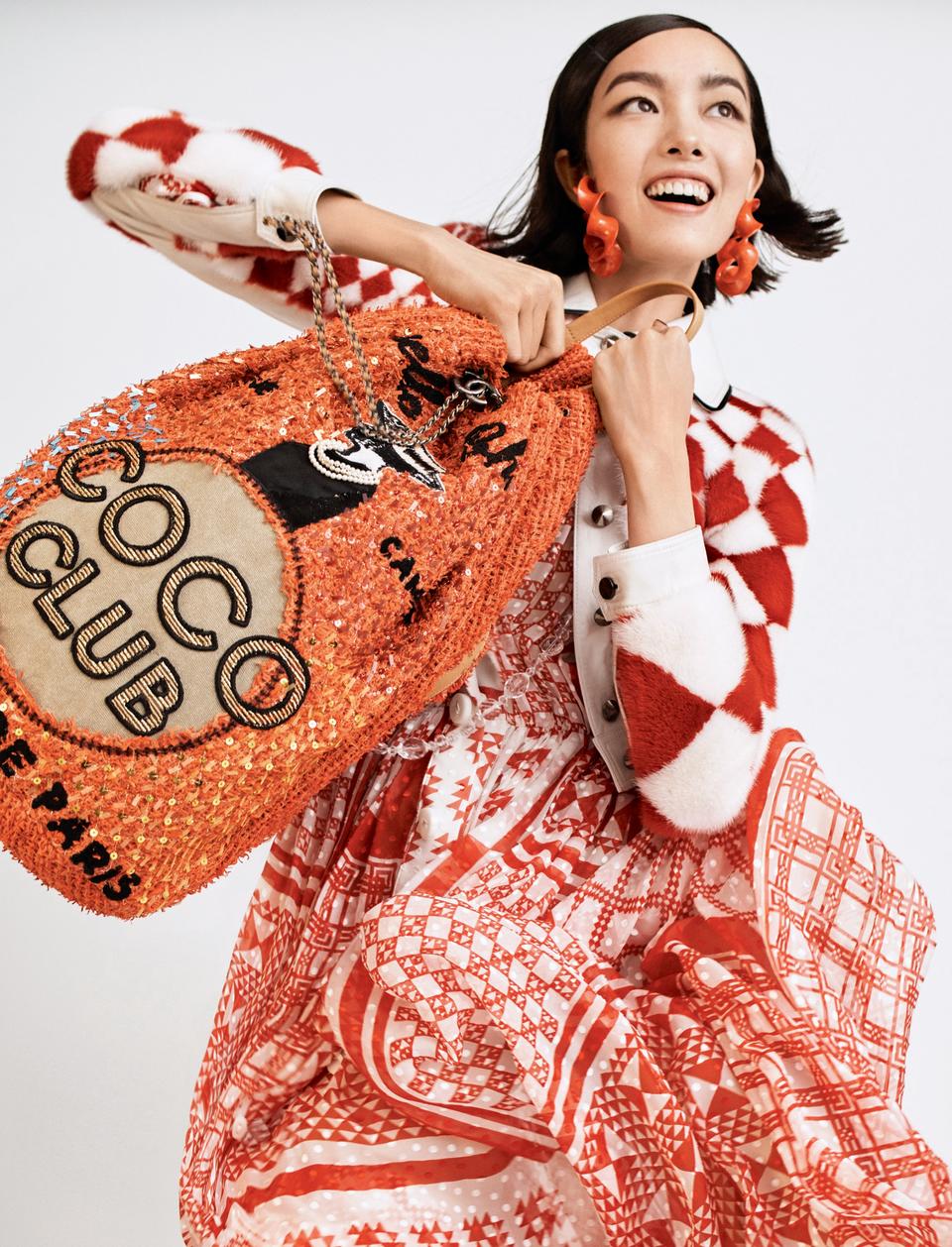 Fei Fei Sun in Fendi’s leather-and-mink jacket and dress and Chanel backpack.