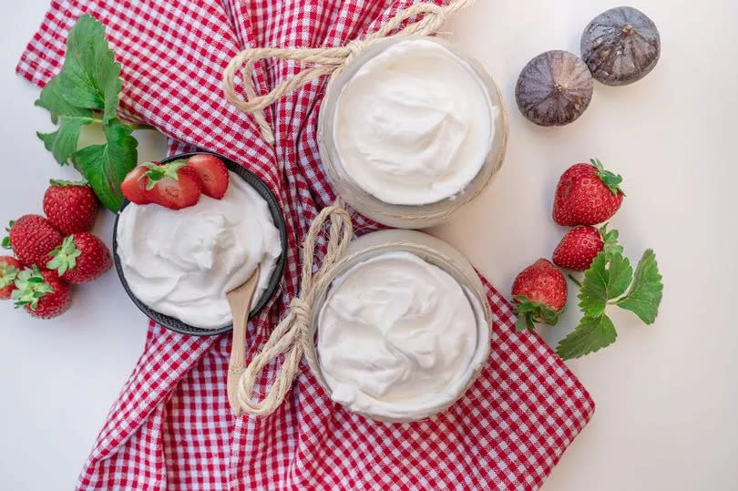 Healthy breakfast with Fresh greek yogurt on background.