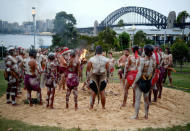 Traditionally dressed Aboriginal performers participate in a smoking ceremony on the foreshore of Sydney Harbour as part of Australia Day celebrations in Sydney, Australia, January 26, 2017. AAP/Brendan Esposito/via REUTERS