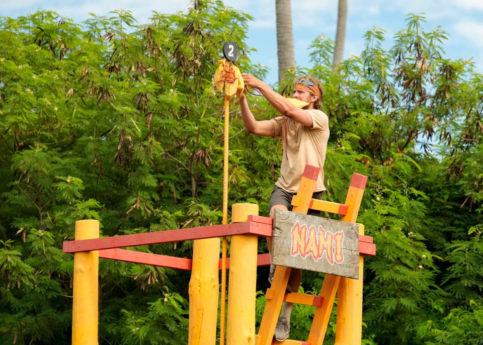 French Camp, Miss., science teacher Hunter McKnight works on a challenge with the Nami tribe in the "Tiki Man" episode, which airs at 7 p.m. Wednesday on CBS.