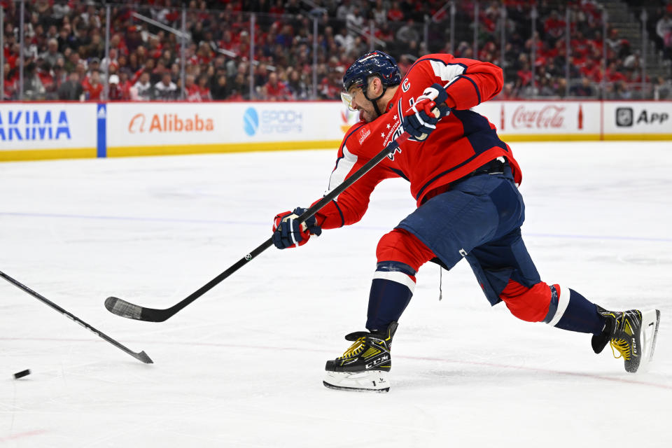 Washington Capitals left wing Alex Ovechkin shoots during the second period of the team's NHL hockey game against the Tampa Bay Lightning, Saturday, April 13, 2024, in Washington. (AP Photo/John McDonnell)