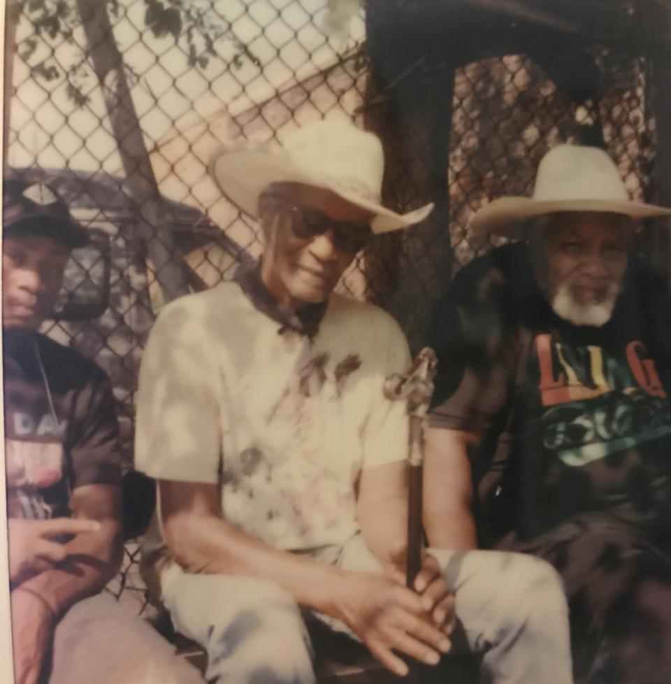 Butchie, "Choo Choo" Charlie", and "El Dog" Ellis Ferrell hang out on Fletcher Street in the summer of 2020.<span class="copyright">Hannah Gaudite for Fletcher Street Urban Riding Club</span>