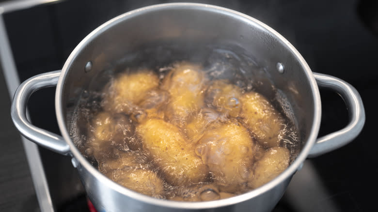 Pot of boiling potatoes