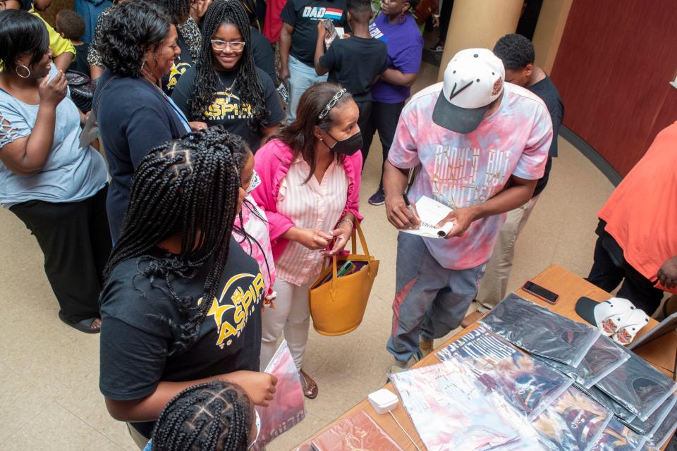 Brandon Leake, winner of season 15 on "America's Got Talent," talks with guests at Alabama State University for the ASU ASPIRE summer camp's showcase on Friday, June 23, 2023. 