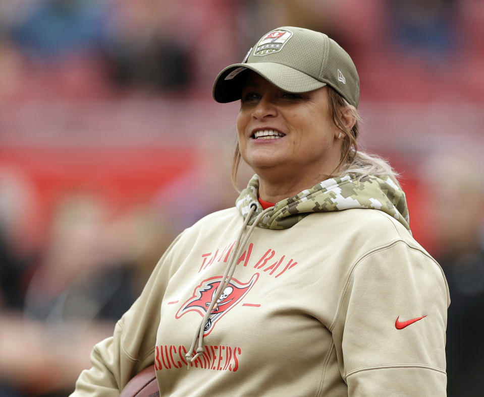 FILE - Tampa Bay Buccaneers coach Lori Locust looks on before an NFL football game against the New Orleans Saints, Nov. 17, 2019, in Tampa, Fla. Last year, Buccaneers assistant defensive line coach Locust and assistant strength and conditioning coach Maral Javadifar became the first female coaches on a team to win the Super Bowl. (AP Photo/Chris O'Meara, File)