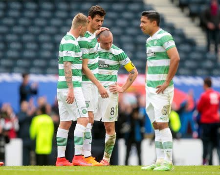 Football - Inverness Caledonian Thistle v Celtic - William Hill Scottish FA Cup Semi Final - Hampden Park, Glasgow, Scotland - 19/4/15 Celtic's John Guidetti, Nir Bitton, Scott Brown and Emilio Izaguirre look dejected at the end of the match Action Images via Reuters / Graham Stuart Livepic EDITORIAL USE ONLY.