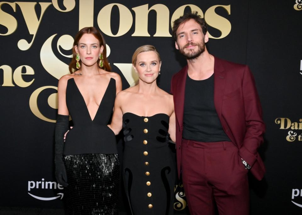 Riley Keough, Reese Witherspoon and Sam Claflin at the premiere of "Daisy Jones & The Six" held at TCL Chinese Theatre on February 23, 2023 in Los Angeles, California.