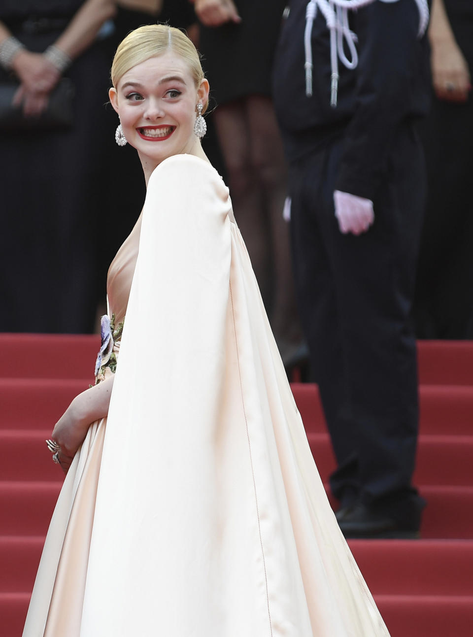 Jury member Elle Fanning poses for photographers upon her arrival at the opening ceremony and the premiere of the film 'The Dead Don't Die' at the 72nd international film festival, Cannes, southern France, Tuesday, May 14, 2019. (Photo by Arthur Mola/Invision/AP)